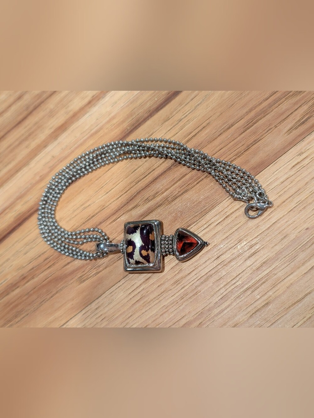 Silver-Tone Leopard Print Pendant Necklace with Brown Gem Accent